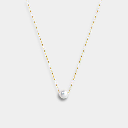 Enhance your elegance with a Floating Akoya Necklace, featuring a gold chain and a stunning pearl pendant.