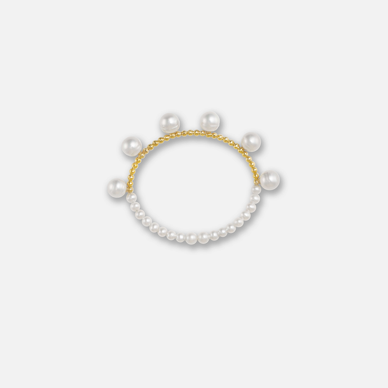 Elegant pearl bracelet with gold beads on a white background. Perfect for adding a touch of sophistication to any outfit.