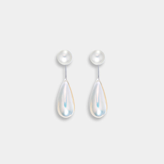 Enhance your look with elegant white pearls on Drop Mabe Pearl Piercing earrings.