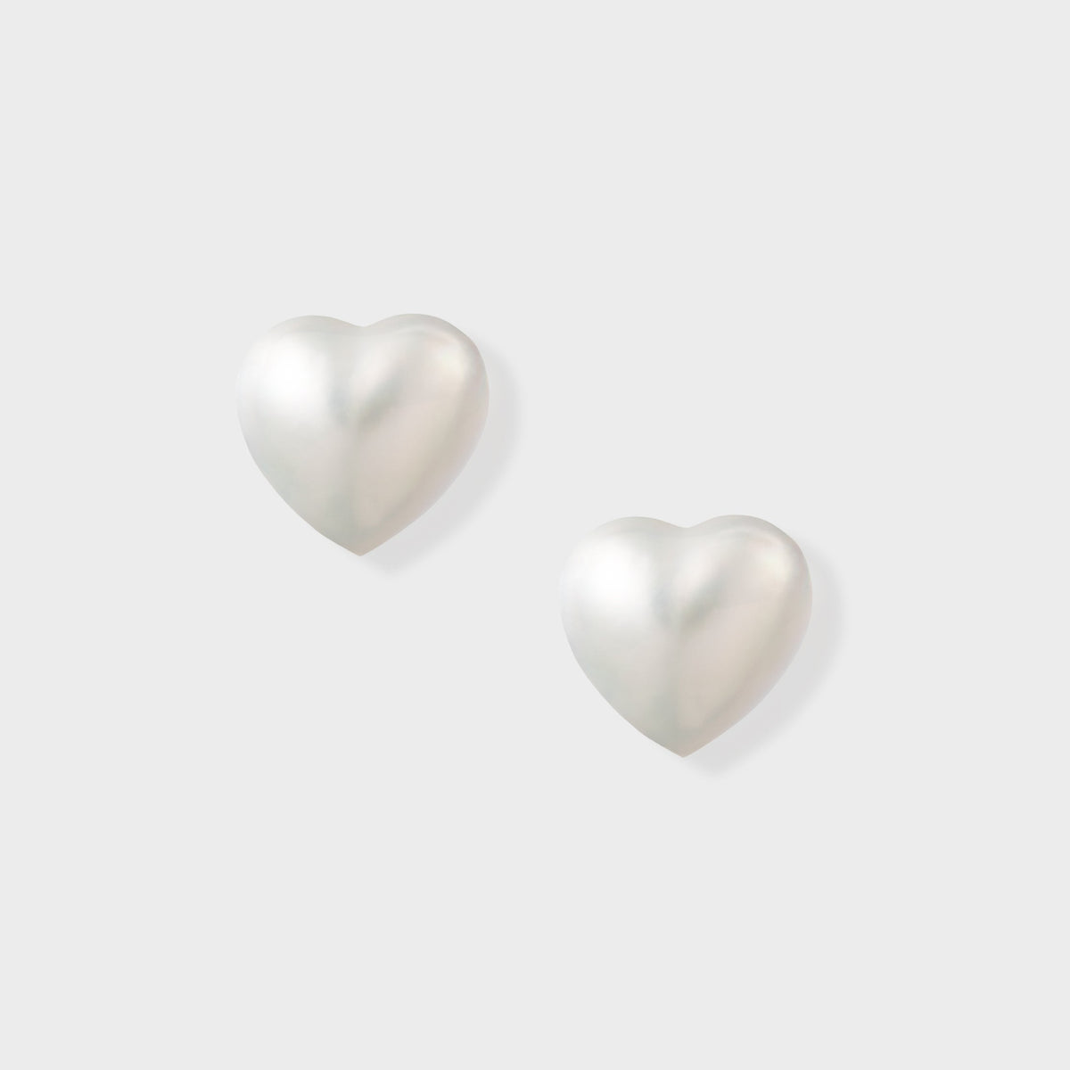 Heart Pearl Stud Pierce: heart-shaped Mabe pearl studs in 18K yellow gold