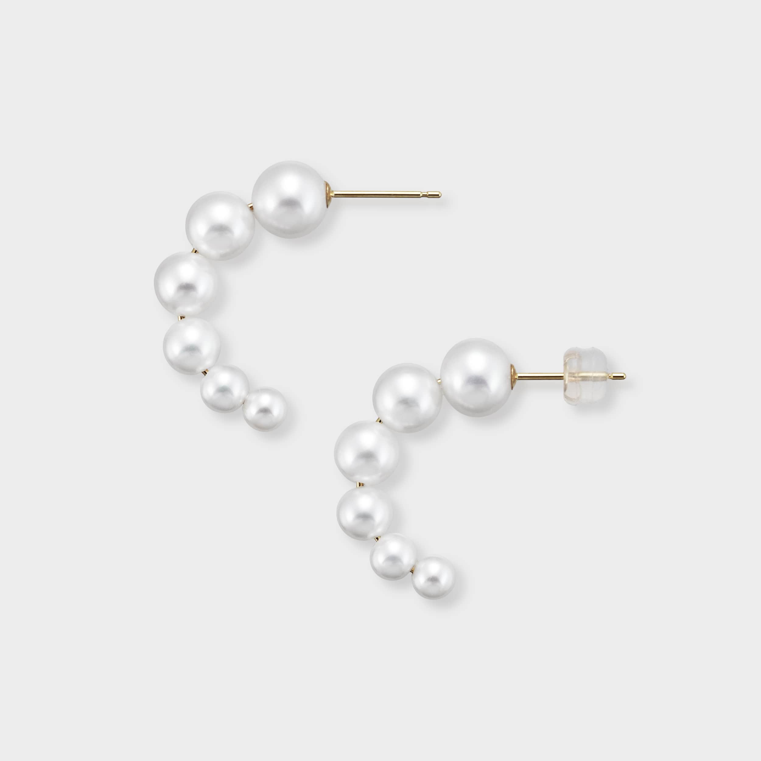 Versatile pearl half-hoop earrings, featuring a delicate row of pearls in a charming C-shape, designed for comfort and captivating style. These stunning earrings are the perfect accessory to elevate your daily elegance. Treat yourself to the timeless beauty of pearls!