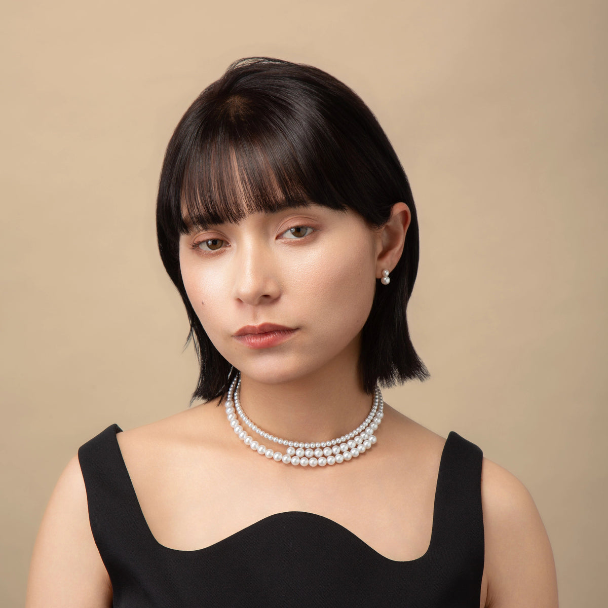 Infinity Necklace worn with a black top