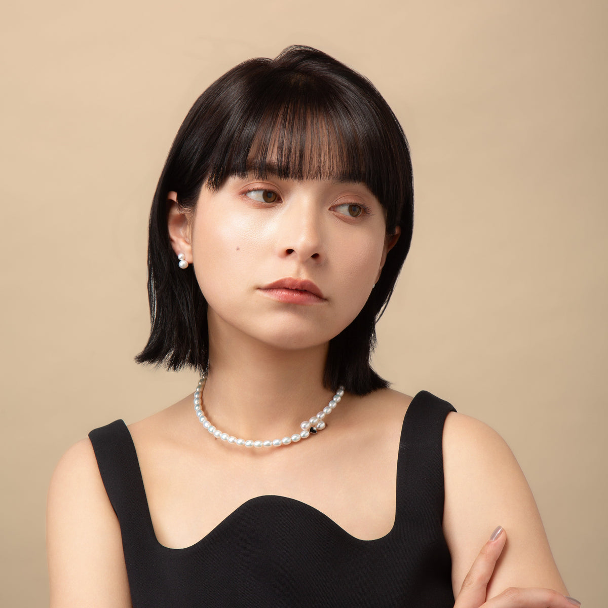 Black Enamel Pearl Choker worn with a black top, alternate view