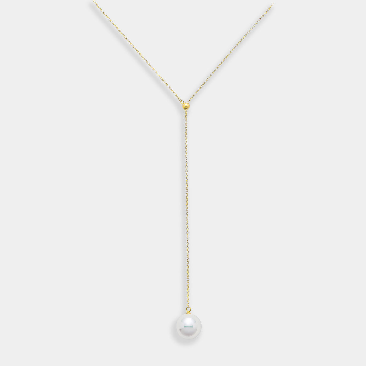 Fancy Pearl Lariat Necklace: a 10mm freshwater pearl on an 18K yellow gold lariat chain