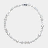 Elegant freshwater pearl necklace featuring a silver clasp, perfect for adding a touch of sophistication to any outfit.