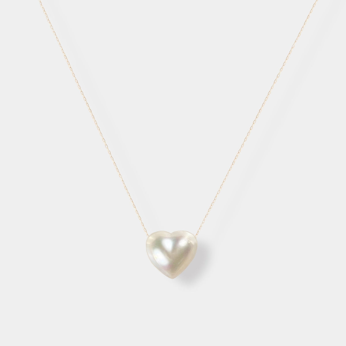 Heart Pearl Chain Necklace: a Mabe heart pearl on an 18K yellow gold chain