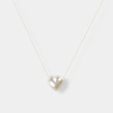 Enhance your elegance with our exquisite Heart Pearl Chain Necklace - a stunning white pearl heart pendant on a delicate gold chain.