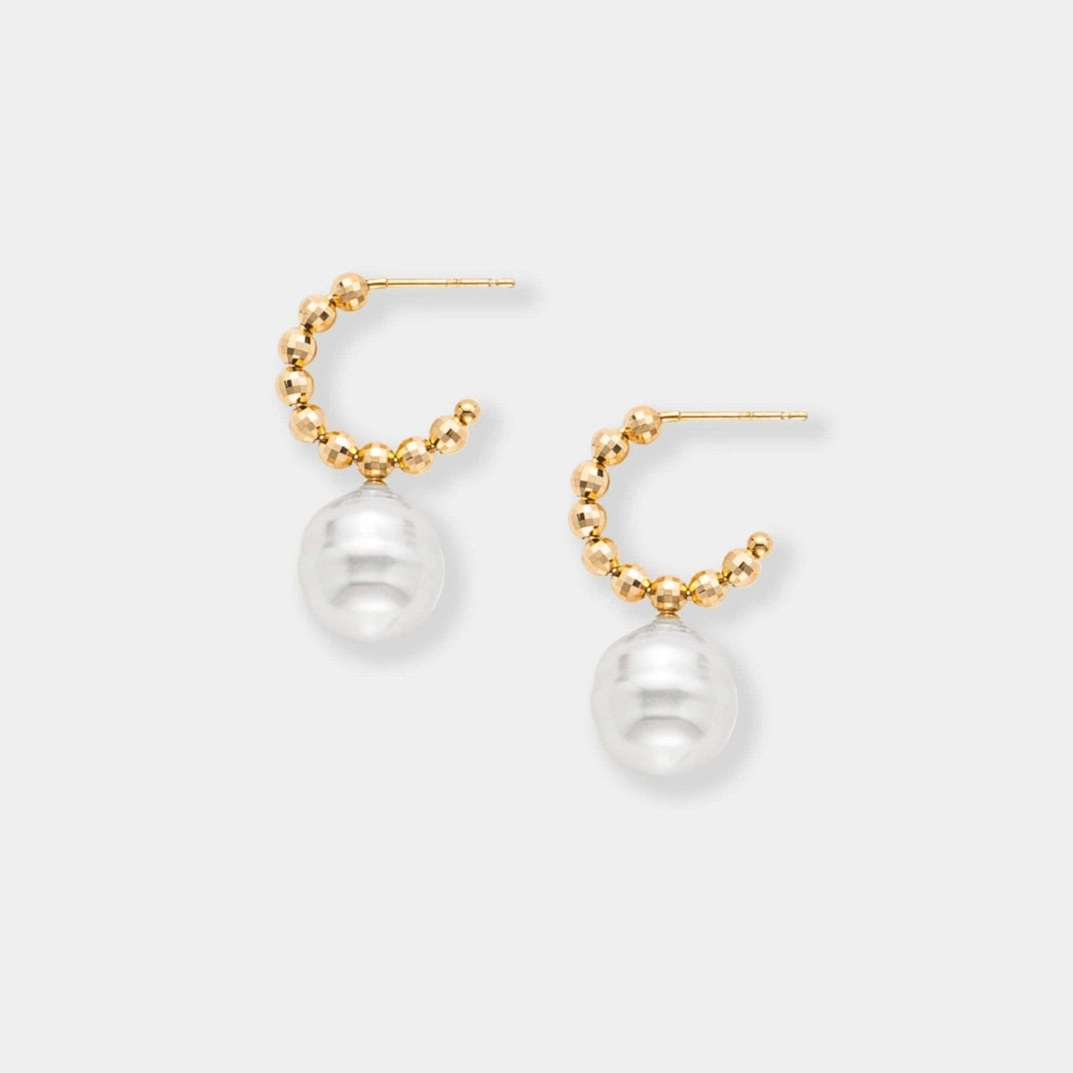 Pearl Dot Gold Pierce, angled view