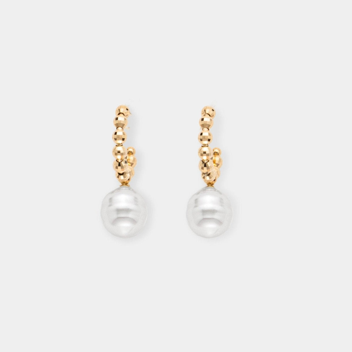Pearl Dot Gold Pierce, front view