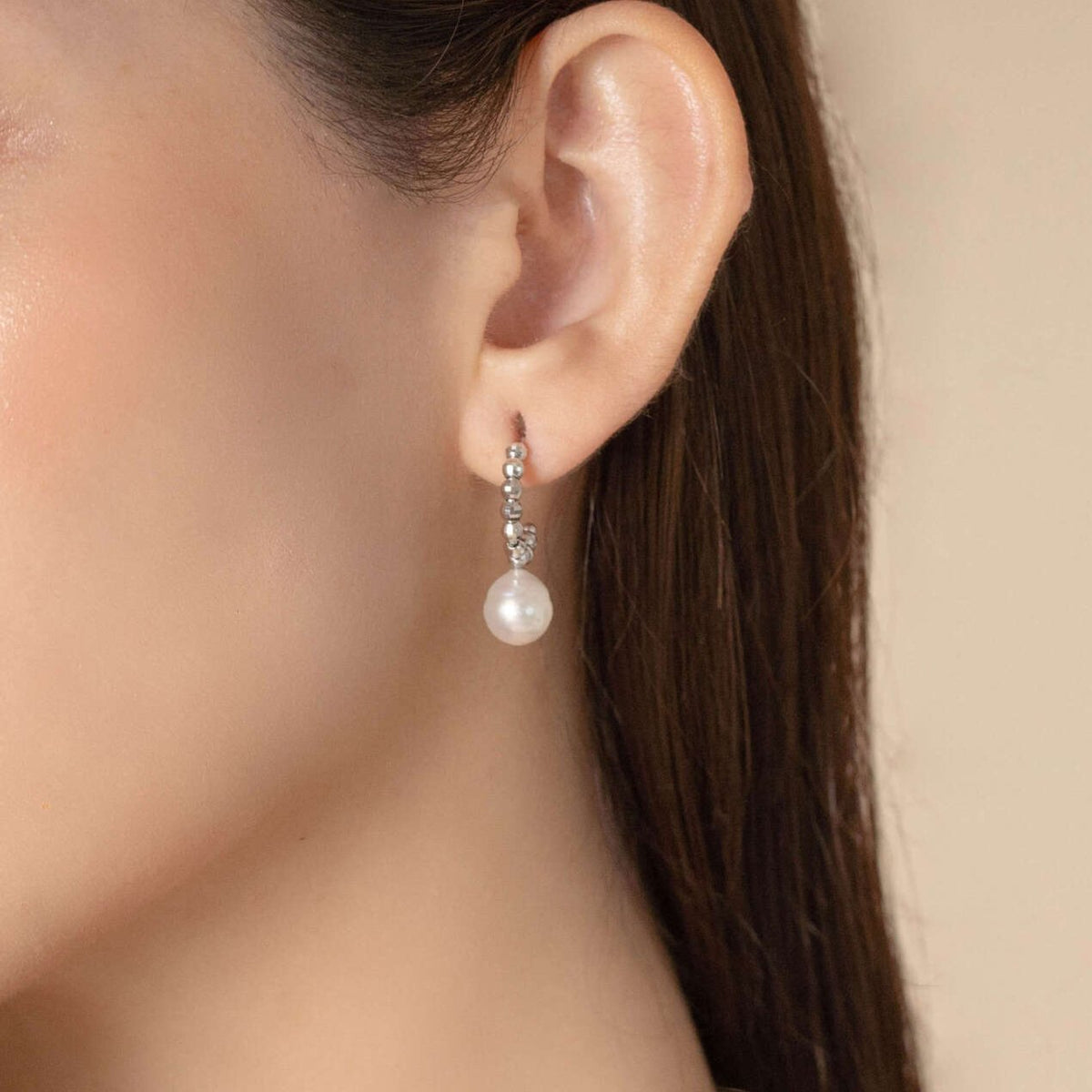 Pearl Dot White Gold Pierce worn on the ear