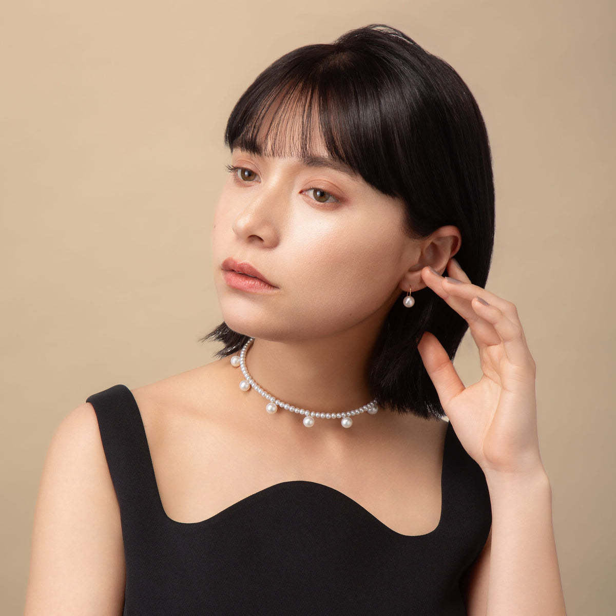 Pearl Dot Freshwater Choker worn with a black top