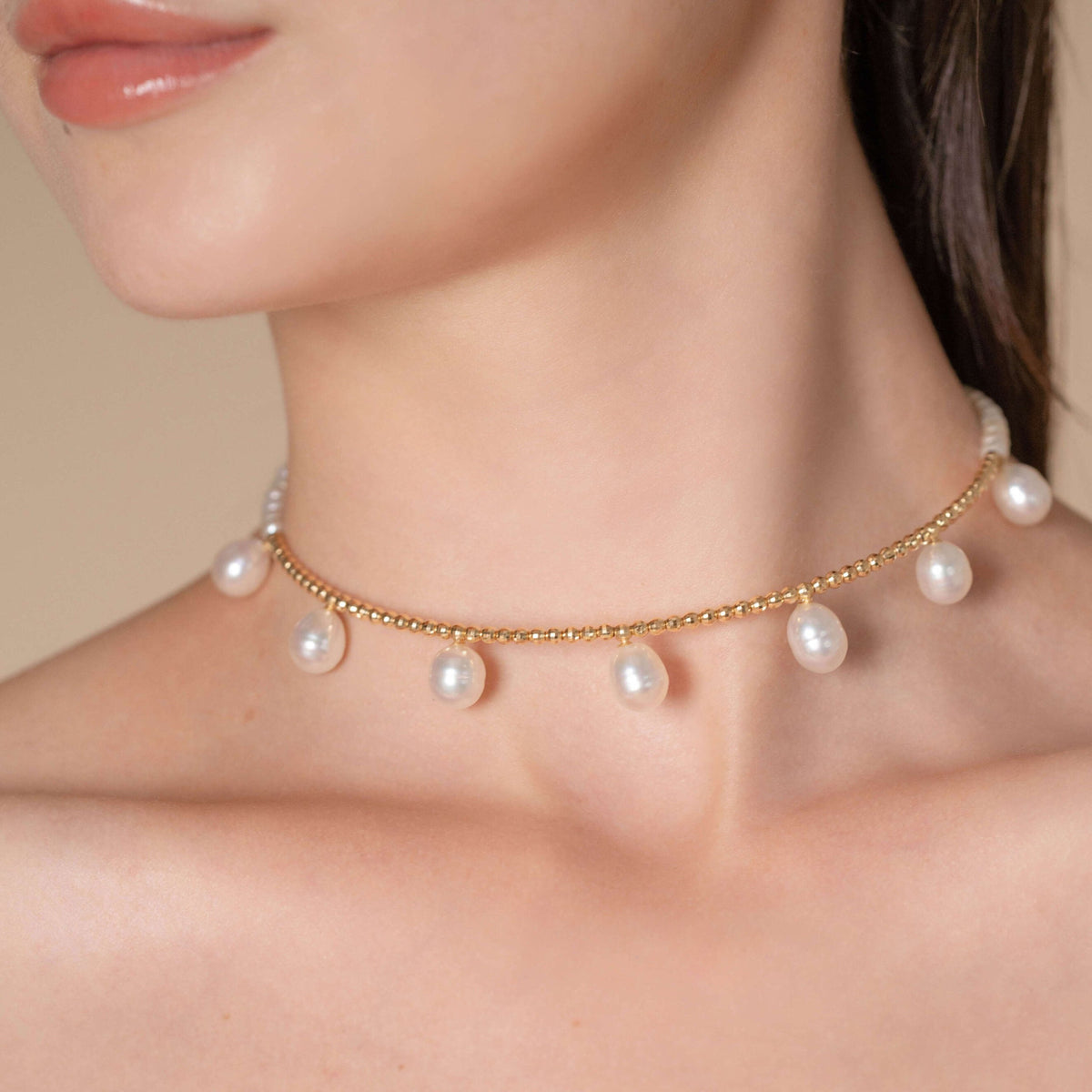 Pearl Dot Gold Choker worn, close-up of the neckline