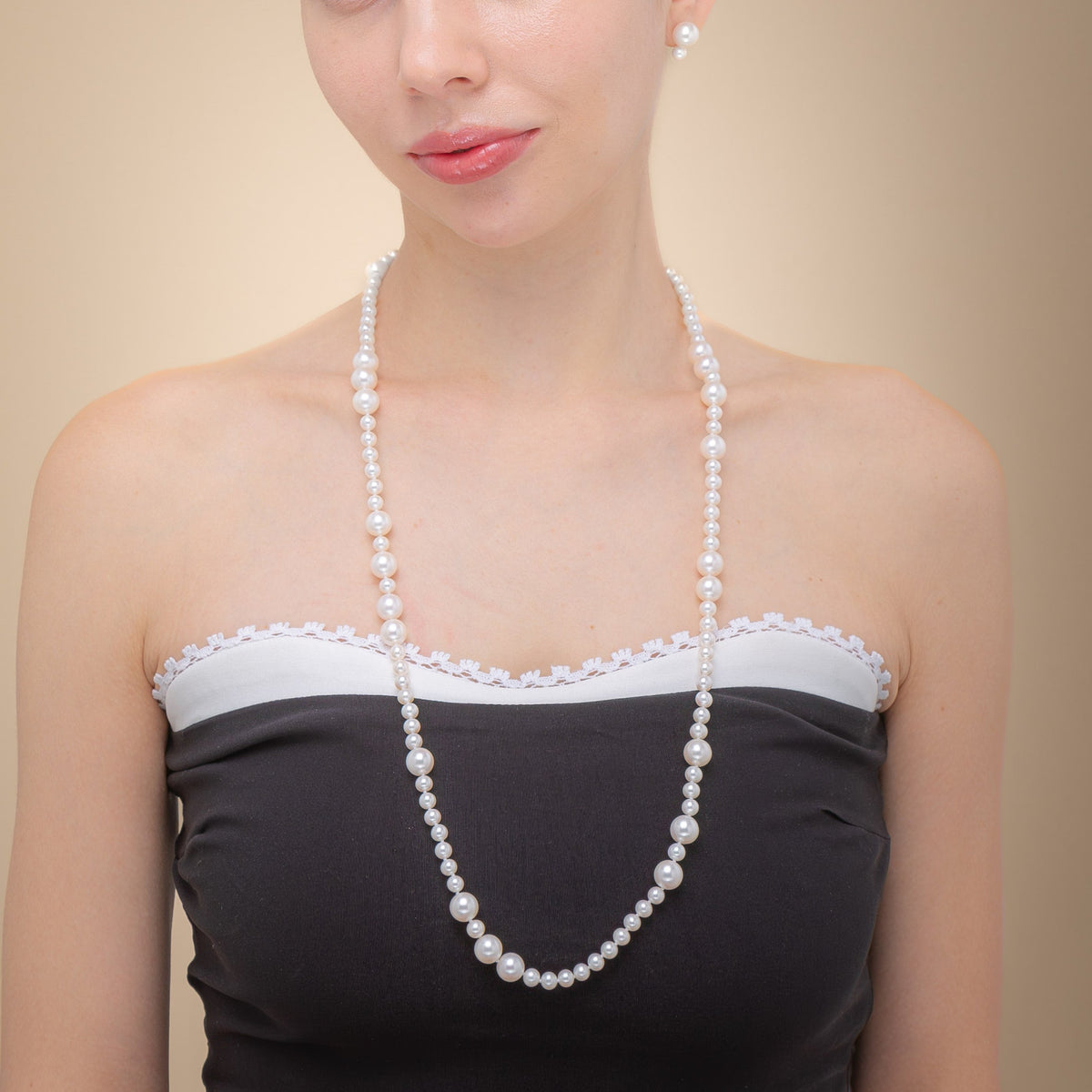 Fancy Pearl Necklace Medium worn long with a black top
