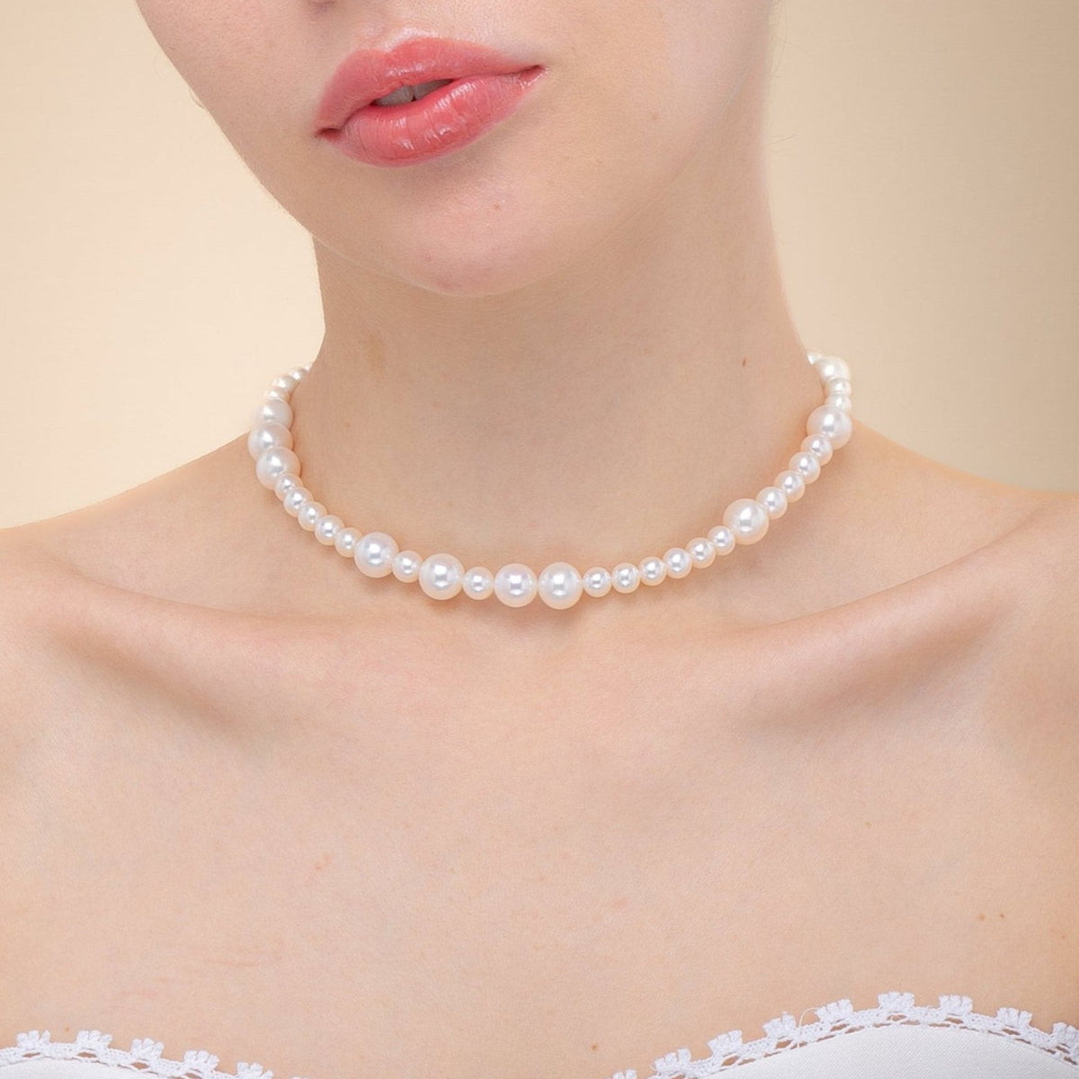 Fancy Pearl Necklace Short worn, close-up