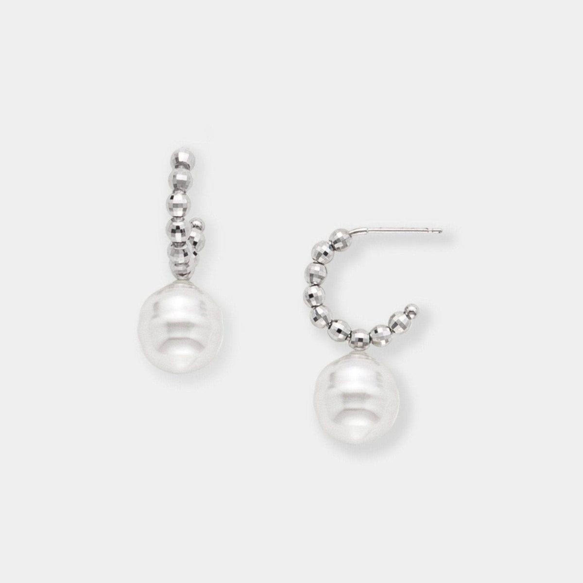 Pearl Dot White Gold Pierce: oval white South Sea pearls on 18K white gold hoops