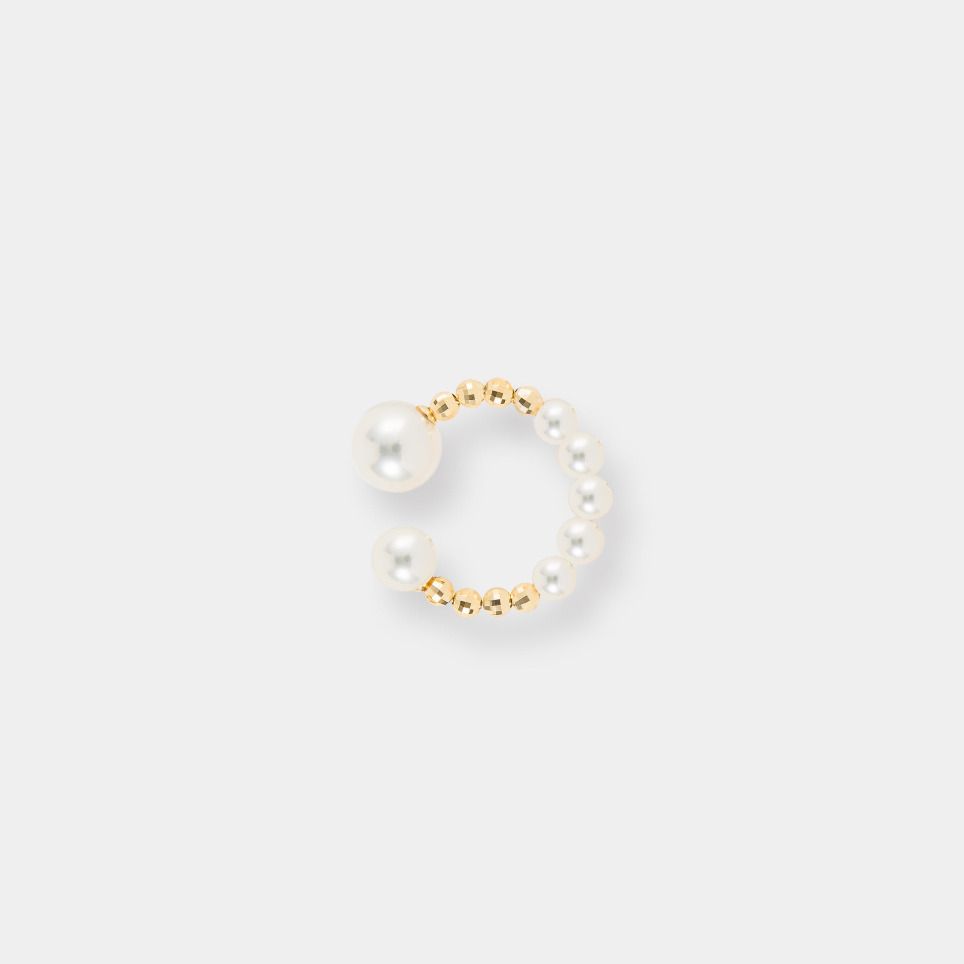 Elevate your style with a captivating gold and white pearl ring & earcuff, beautifully paired with a Twin Pearl Earcuff.