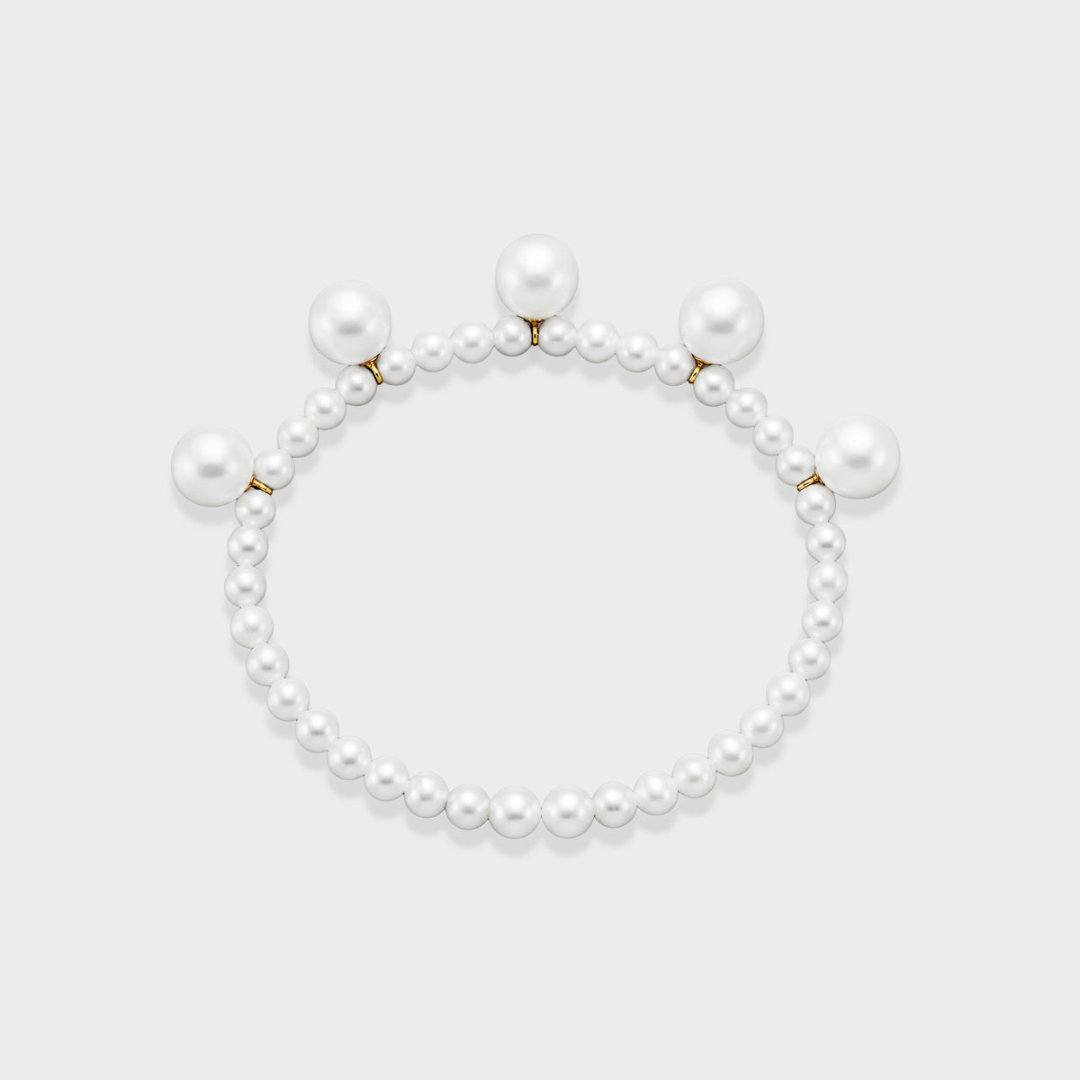 Blair Bracelet: freshwater pearls with larger pearls and 18K yellow gold accents on memory wire