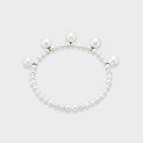 Blair Bracelet: freshwater pearls with larger pearls and 18K yellow gold accents on memory wire