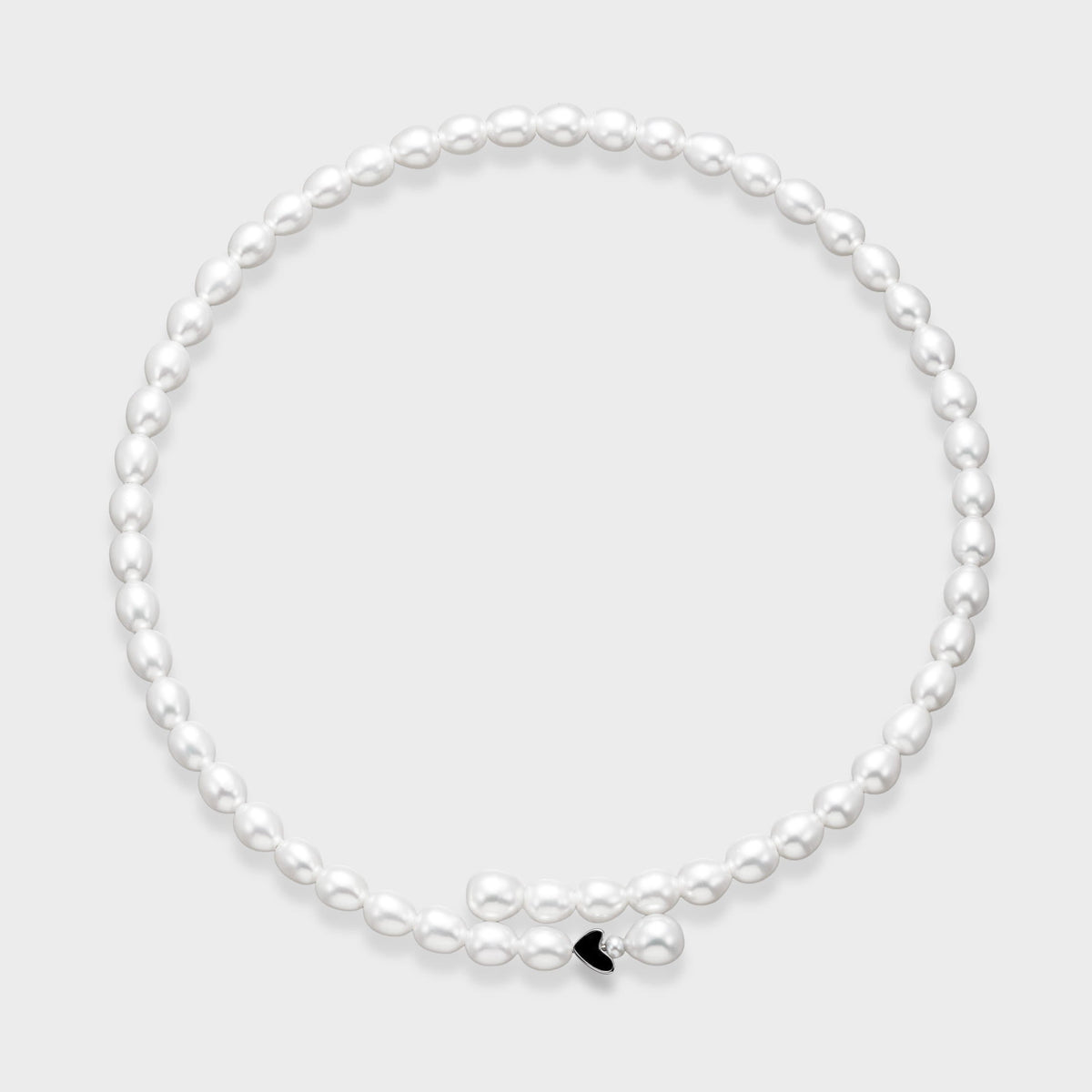 Black Enamel Pearl Choker: oval freshwater pearls with a black enamel heart on memory wire