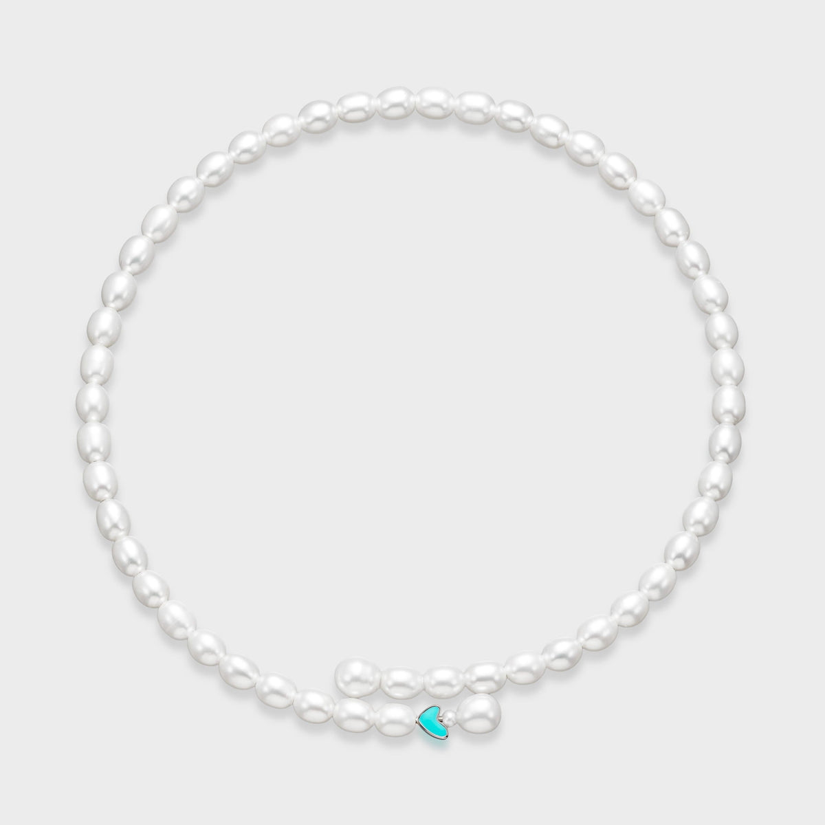 Blue Enamel Pearl Choker: oval freshwater pearls with a blue enamel heart on memory wire