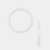 Indulge in sophistication with our pearl necklace, boasting a chain and a mesmerizing pearl drop. Experience the allure of our Oval Pearl Charm Choker.