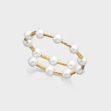 Double-layer gold and pearl bracelet featuring round white pearls and textured gold bar links.