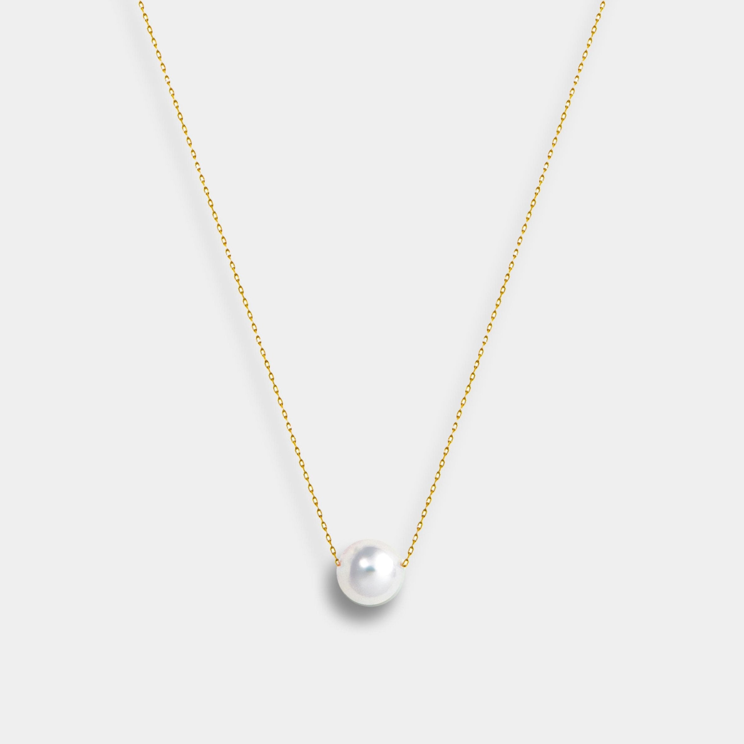 Enhance your elegance with a Floating Akoya Necklace, featuring a gold chain and a stunning pearl pendant.